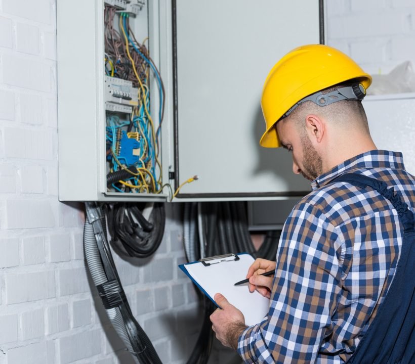 professional-electrician-inspecting-wires-in-electrical-box.jpg professional-electrician-inspecting-wires-in-electrical-box.jpg